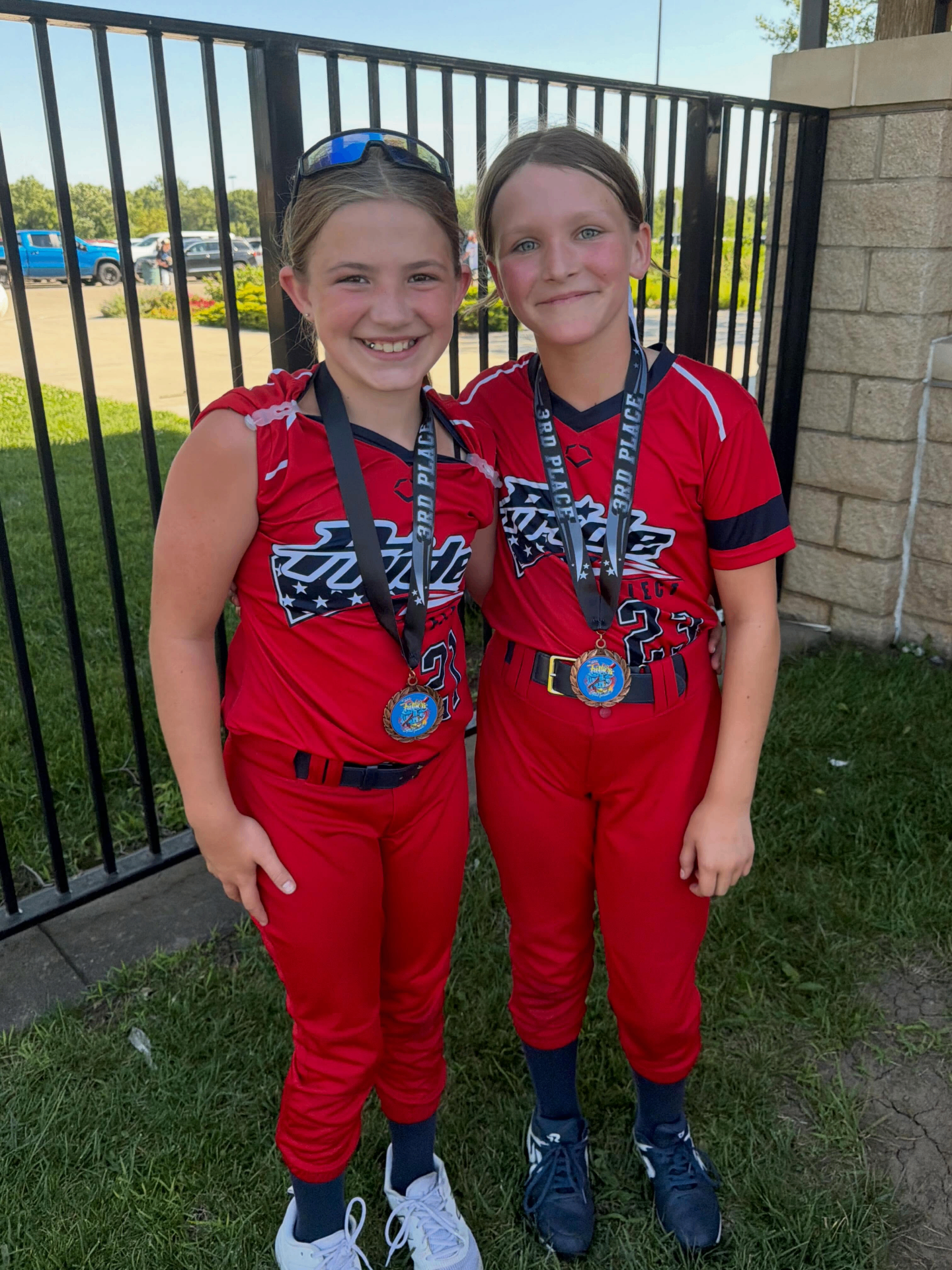 Two Pride athletes wearing medals after a tournament